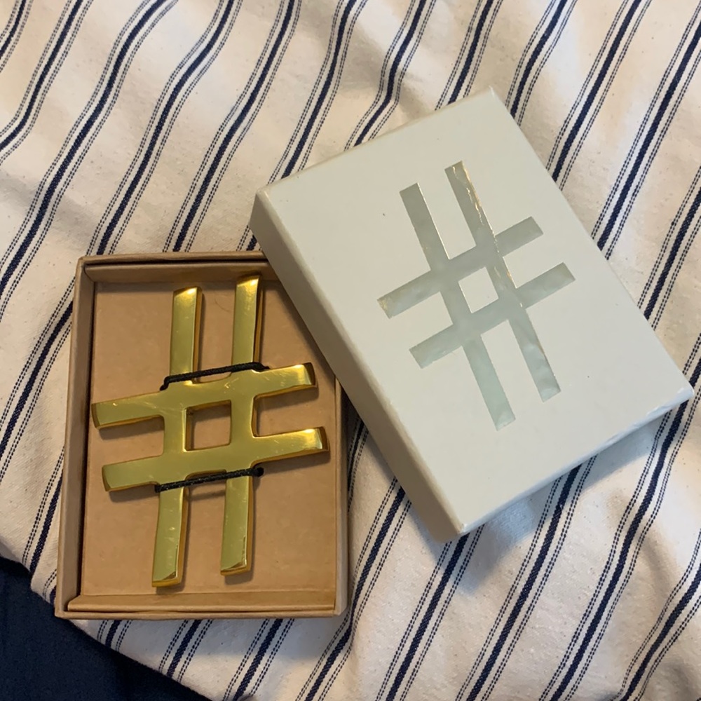West Elm solid brass paperweight.